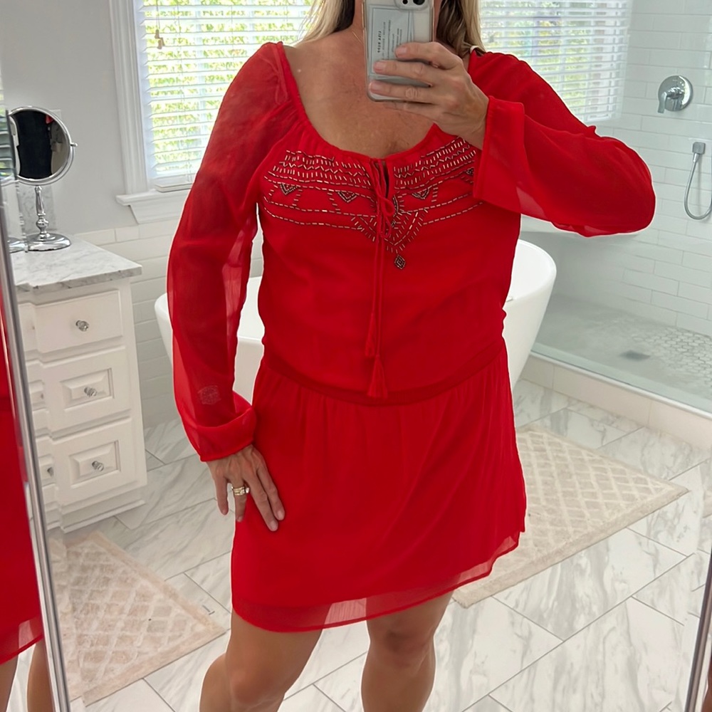 Flowy mini dress with jeweled detailing ideal for country concerts!